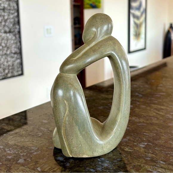 Gray Abstract Stone Sculpture with Fluid Curves - Picture 11 of 12